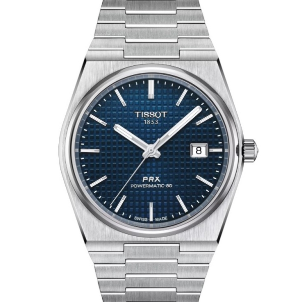 Stainless steel Tissot watch with a textured blue dial, baton markers, and date display