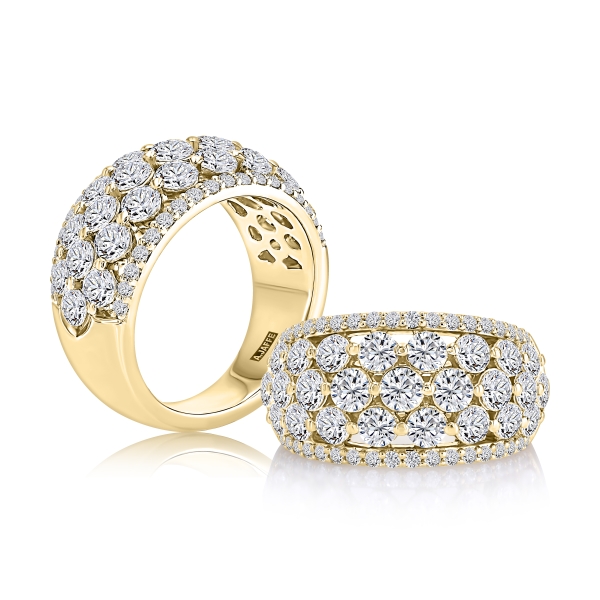 Two gold rings encrusted with rows of sparkling diamonds.