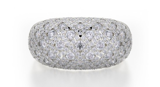 a white gold domed fashion ring with diamonds