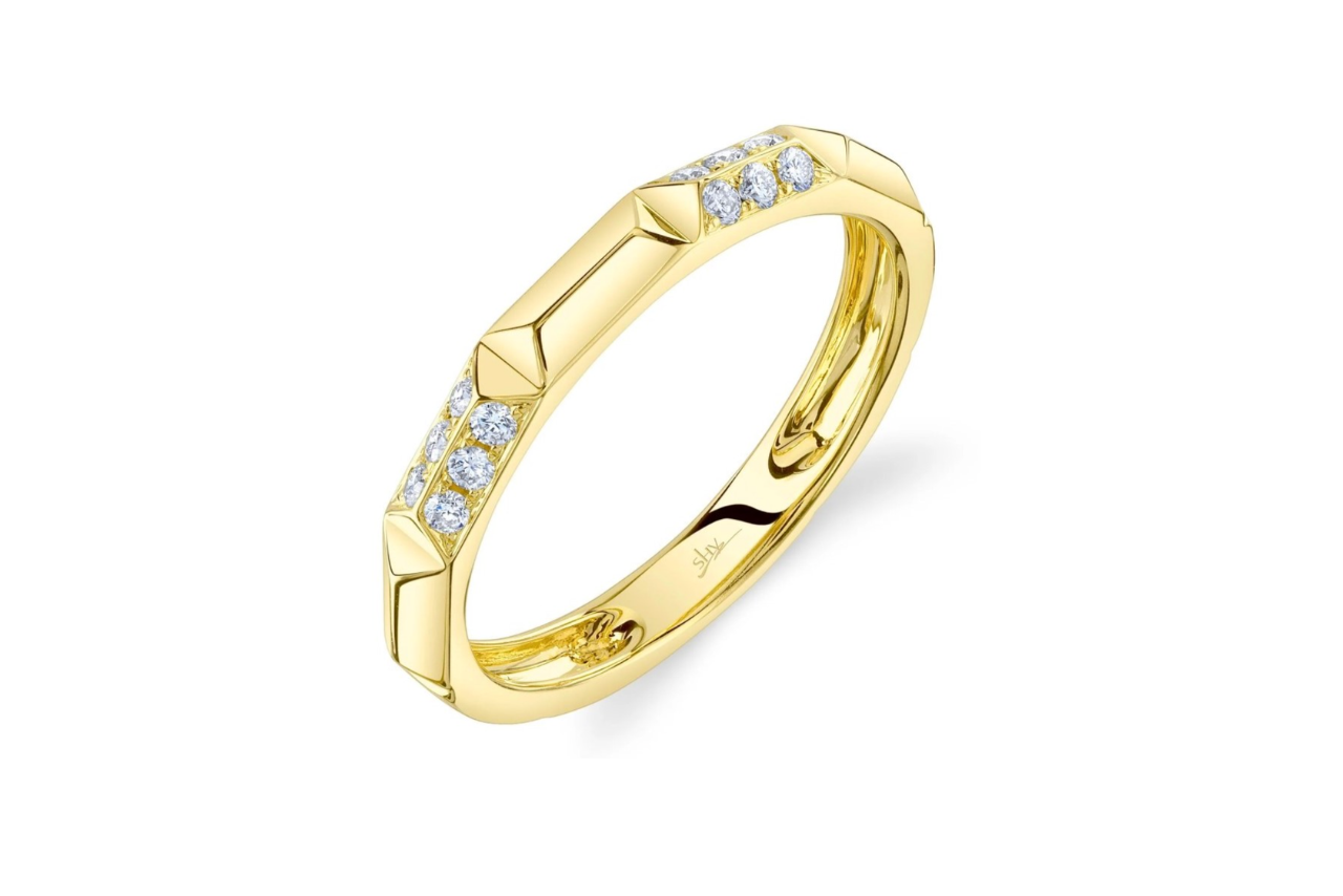 A diamond geometric cut band in yellow gold.